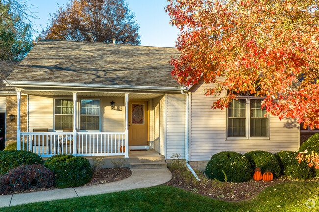 The north side of Geneseo is home to modern ranches among large mature trees.