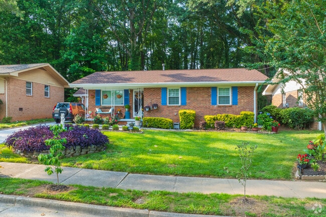 Some residents of Wilson Mill Meadows take pride in keeping their property well-maintained with beautiful gardens and fresh cut lawns.