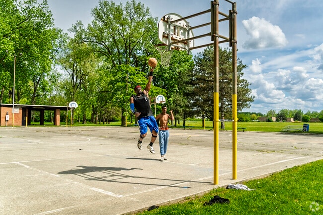 Locals head to Veterans Park for a pickup game of basketball.