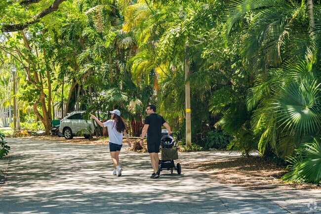 Families in Southwest Coconut Grove enjoy walking the tree covered residential streets.