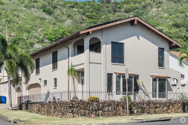 Local flora decorates the yard of this contemporary house in Liliha-Kapālama, Honolulu.
