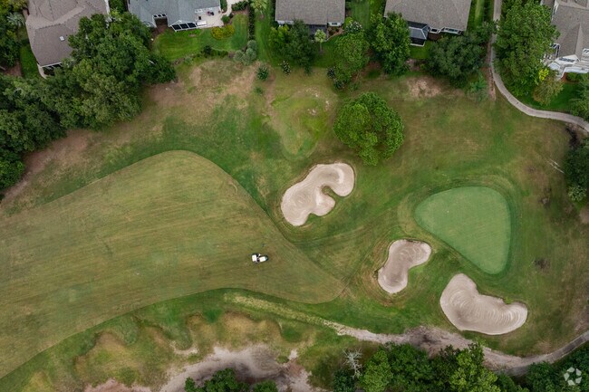 Many residents of The Crescent can enjoy watching golfers play from their back patios.