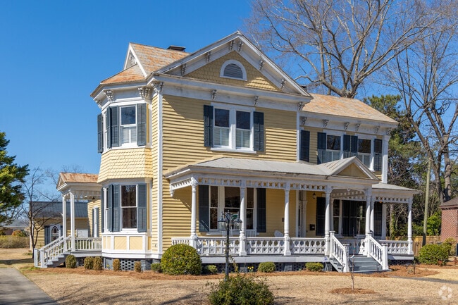 This beautiful two-story double-pile Victorian style home originally built in 1868 in the West Main-North Chesnutt Streets Historic District in Clinton is on the National Register of Historic Places Inventory.