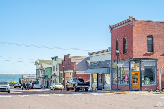 Shops line Wisconsin Lake Superior Scenic Byway downtown.