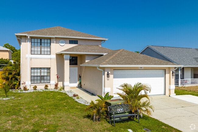 The two-story homes in Jasmine Estates feature large windows and high ceilings.