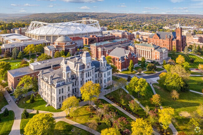 Syracuse University's 700-acre campus is a scenic mix of rolling hills and rich green landscape.