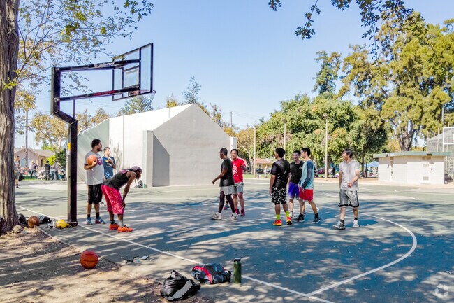 Challenge your friends to a game of basketball at Backesto Park in San Jose.