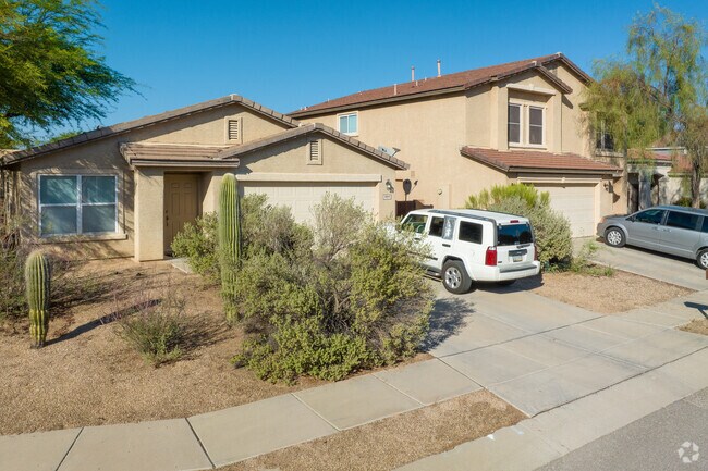 Street trees line the residential roads within the Mesquite Ranch community.