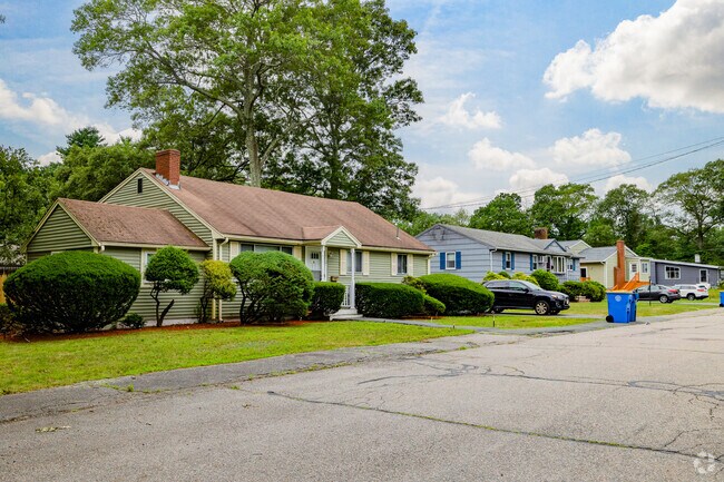 Sidewalks aren't very common in South Randolph, but mature oak trees often dot grassy front yards.