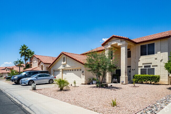 Elegant Santa Barbara-style homes exude timeless charm in Garden Lakes.