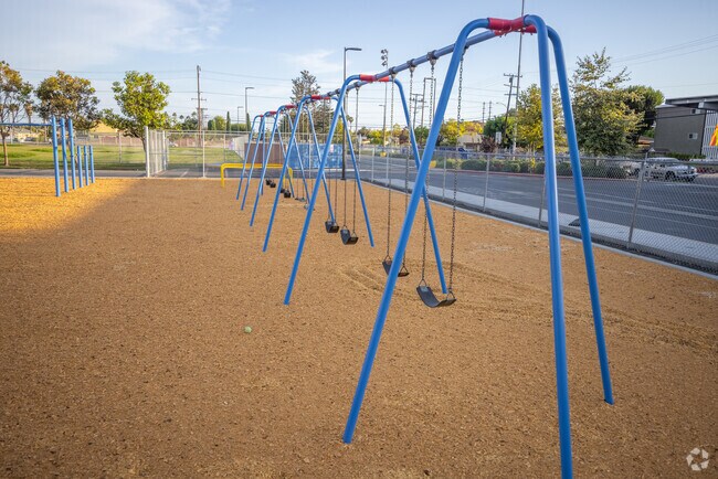 Playground swings at Demille Elementary School.