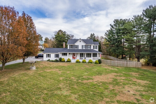 In Owings, colonial homes with front porche offer a blend of traditional elegance outdoor living