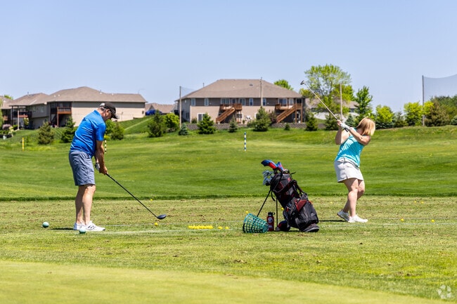 Get in a few practice swings at the driving range at Tiburon Golf Club near Pheasant Run.