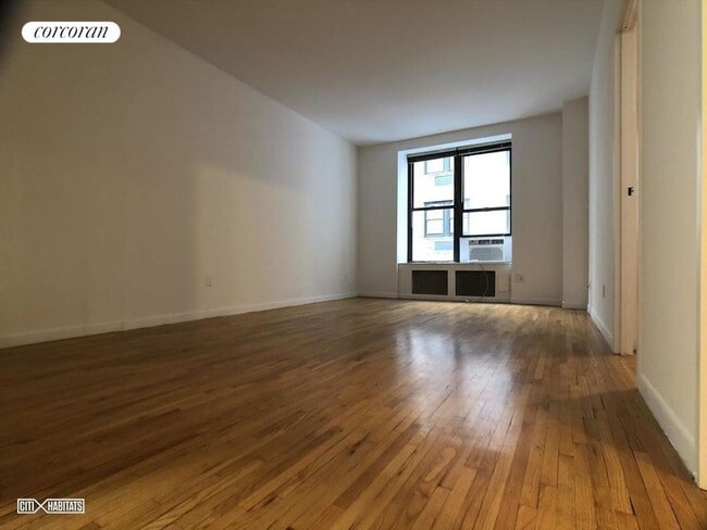 117 W 58th St, New York, NY 10019 - photo 3