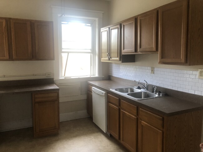 another view of kitchen, full size refrigerator not pictured.