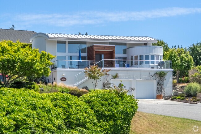 A gorgeous Skyline seven-figure modern home overlooking the bay and just steps from Tugboat Park.