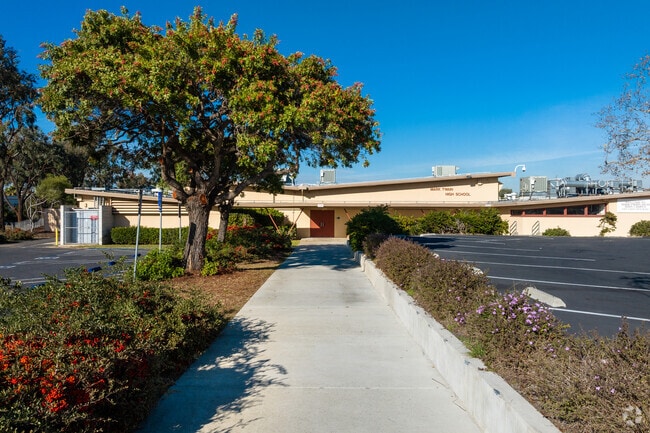 A sidewalk entrance look at Twain High School in Linda Vista.