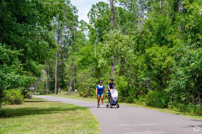 Riverside Village families enjoy the quiet, serene trails that Jay B. Starkey Wilderness Park offers.