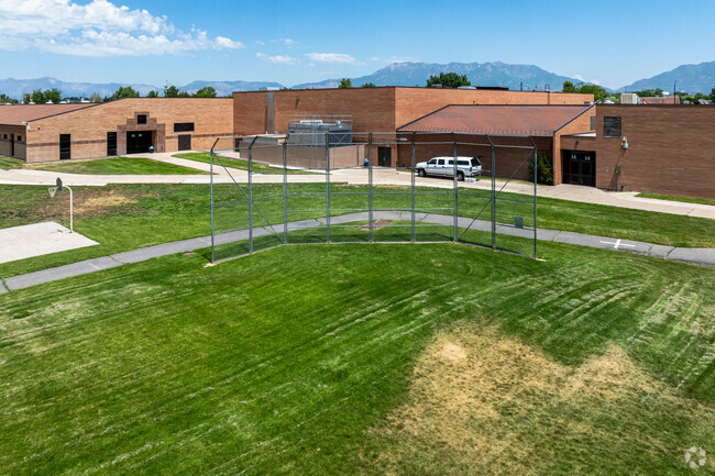 A backstop is located in the field behind Syracuse Jr. High School.