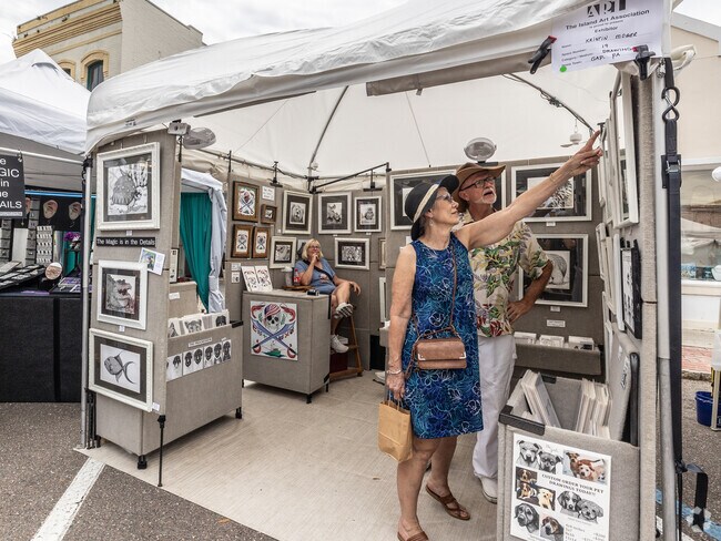 Enjoy seafood and local art at the Isle of Eight Flags Shrimp Festival in Fernandina Beach.
