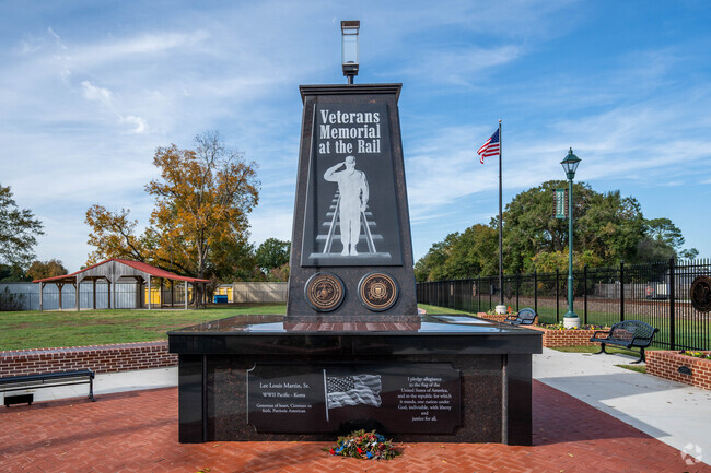 A Veterans Memorial statue sits proudly in central Scott, Louisiana.
