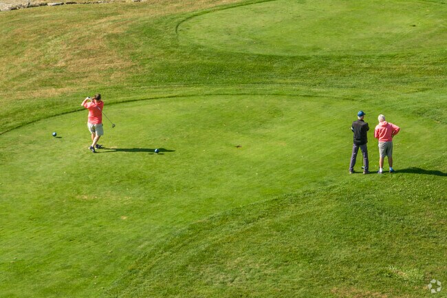 Residents test out their putting skills at Kearney Hill Golf Links.