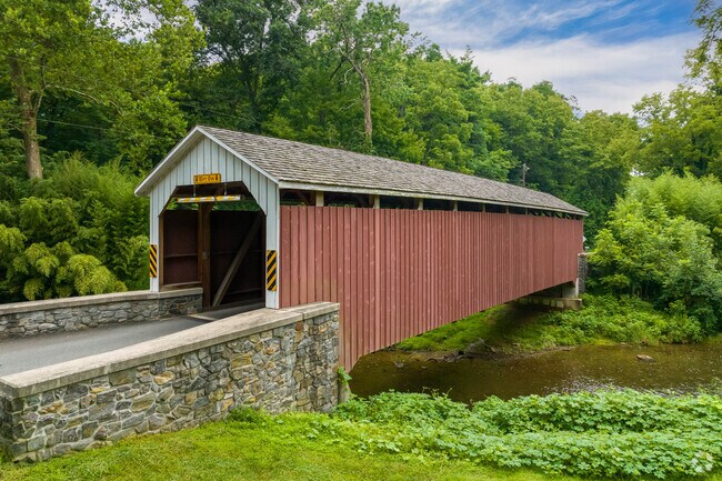 Drive through Siegrist's Mill Covered Bridge near Rheems.