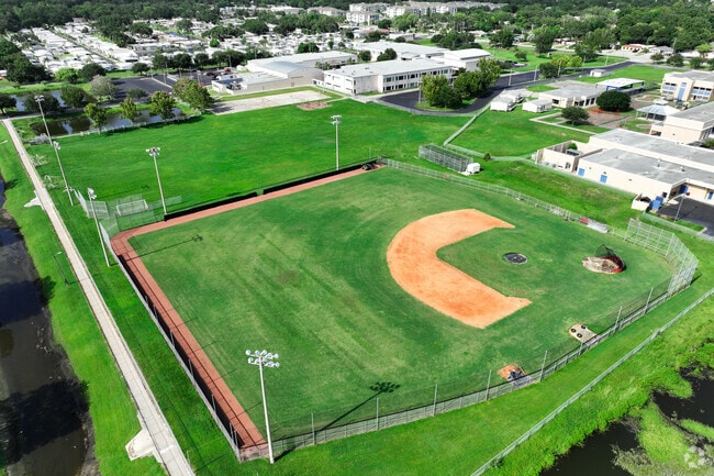 Practice or play a game at the baseball field at Dunedin Elementary School.