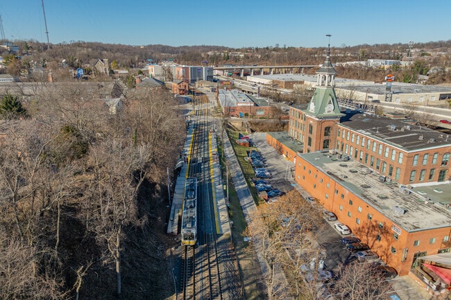 The Woodberry Light Rail Station is located at the corner of Union and Clipper Avenues.