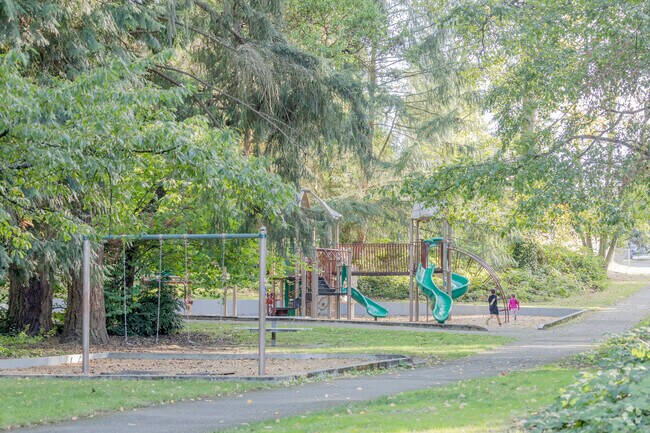 Kids play tag at the Olympic View Park in Twin Lakes WA.