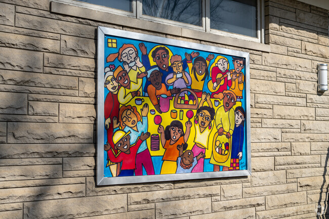 Vibrant murals adorn buildings and homes throughout Elkhart's Indiana neighborhood.