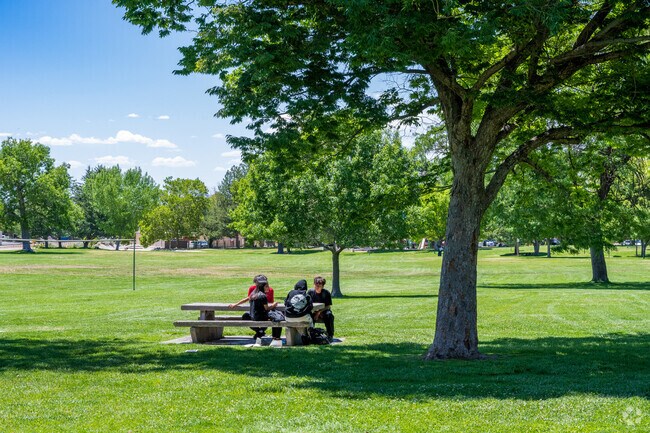 Hodgin kids enjoy some snacks in the shade at Montgomery Park.