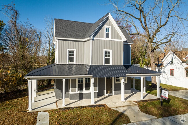 This new-construction home in Milford is designed to look like an old, classic farmhouse.