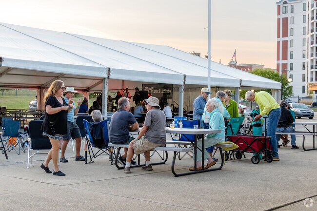 Hot Harbor Nights in downtown Racine draw visitors from Reservoir Park.