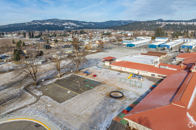 The Otis Orchard School has a small playground behind the school