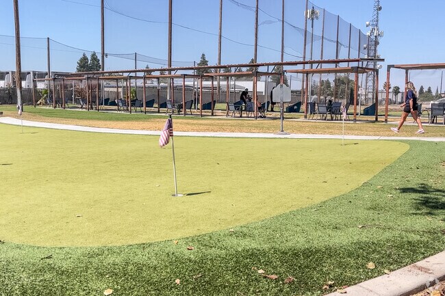 Perfect your golf swing at Ultimate Drive near Stone Creek.