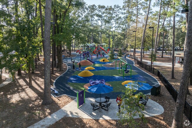 Albert "Ray" Massey Park has a large playground where kids can have hours of fun.
