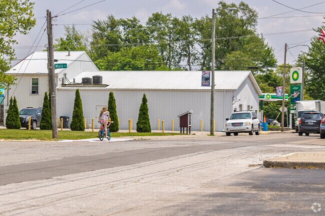 Children ride bikes during the day through Gaston's quiet streets.