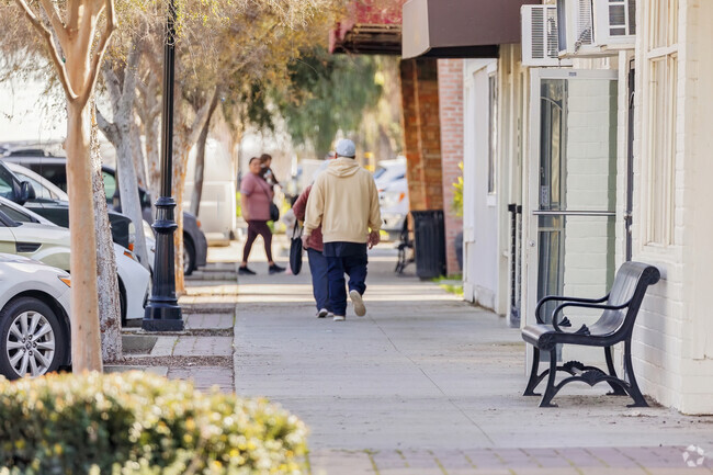 Local residents stroll through Downtown Waterford, Ca.