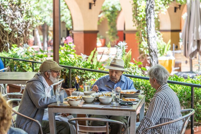 A group enjoys a mid-day lunch at Lima Restaurant nearby Midtown Concord.