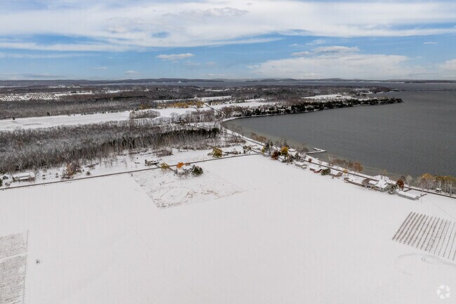 Snow-covered fields meet Lake Champlain’s shoreline in South Hero.