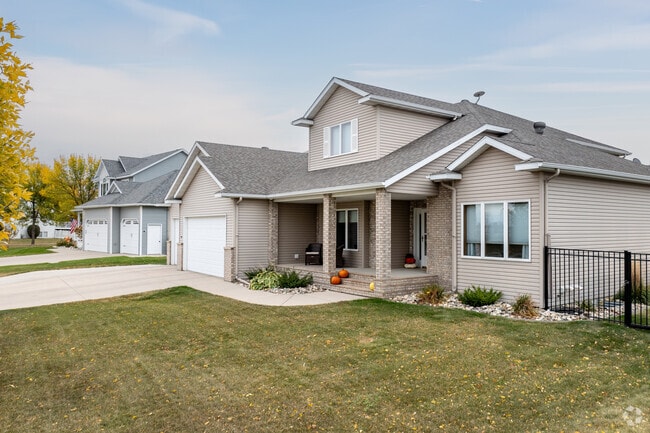 Charleswood homes are newly built and boast professionally landscaped lawns.