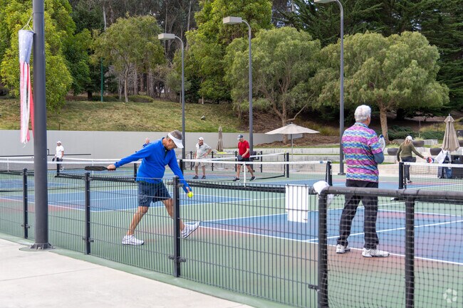 Locals in Woodlands head to the Monarch Club for pickleball.