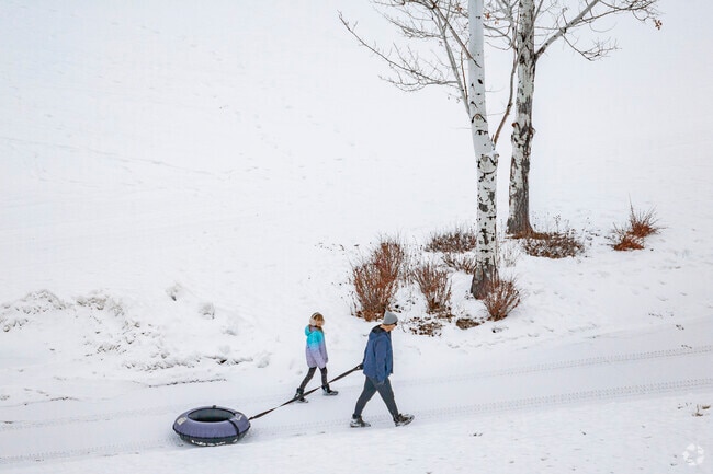 Winter in Cattle Creek brings excitement with tubing on nearby hills, where families can race down snowy slopes and share laughter. It's a delightful way to embrace the season's joy and create lasting memories.