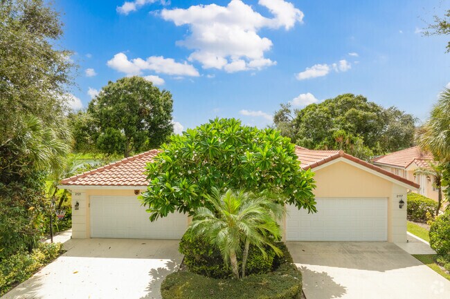 The Riverwalk neighborhood offers Mediterranean style villas with lush landscaping.