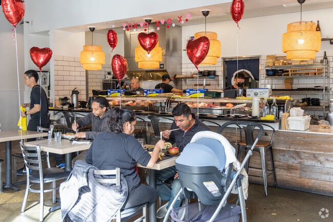 Sushi is around every corner in downtown Belmont near Antique Forest Homes.