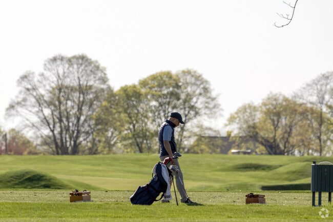 Nearby golf courses are one of the many perks of the Rumford neighborhood lifestyle.