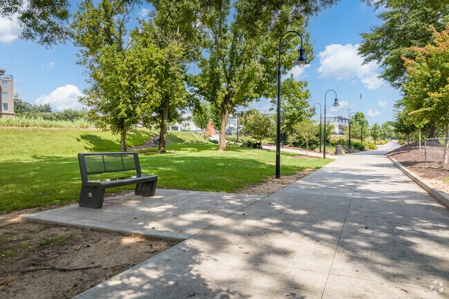 Take a break and enjoy the cool breeze on the bench along the walking path in North Augusta.