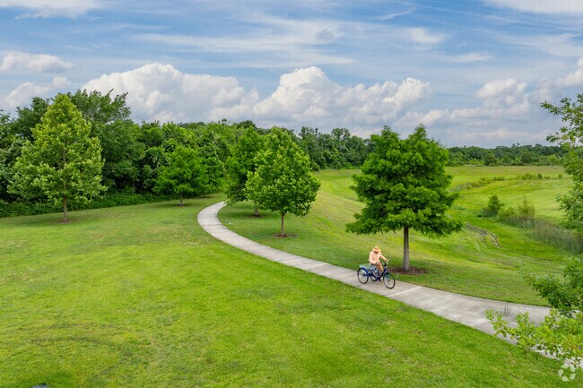 Residents of The Lakes at Highland Glen can grab a bike and ride Pearland's Clear Creek Trail.