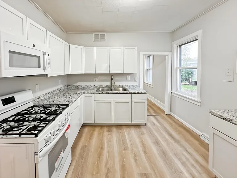 1328 N Main St unit 1328 n Main Street L, Oshkosh, WI 54901 - photo 1